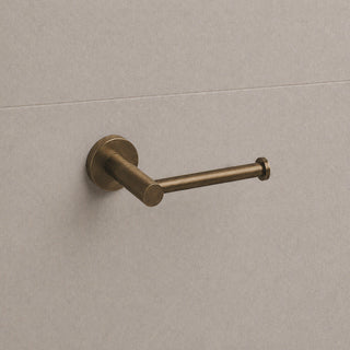Reno antique brass toilet roll holder on white background full view