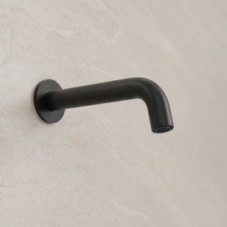 Reno matt black wall spout tap on white background full view