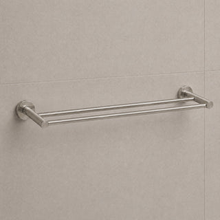 brushed nickel towel rack on a tiled bathroom wall