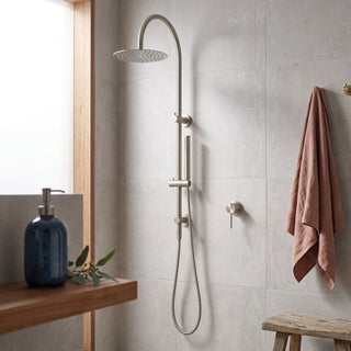 Reno brushed nickel shower mixer tap in modern bathroom setting