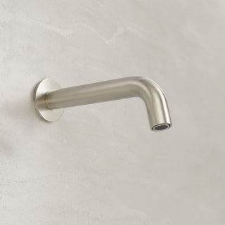 Reno brushed nickel wall spout tap on white background full view