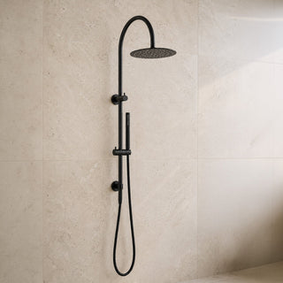 Black shower set with handheld shower head on a beige tiled wall
