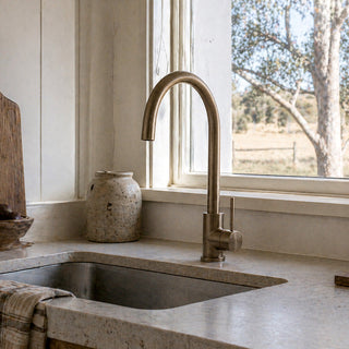 Reno antique brass kitchen mixer tap in lifestyle kitchen setting