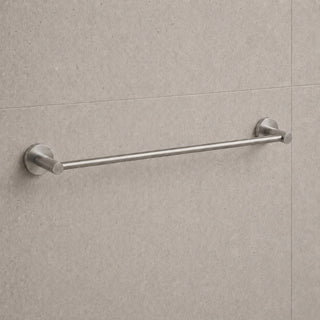 brushed nickel towel bar mounted on a tiled bathroom wall