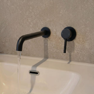 Reno matt black wall spout tap close-up showing spout profile