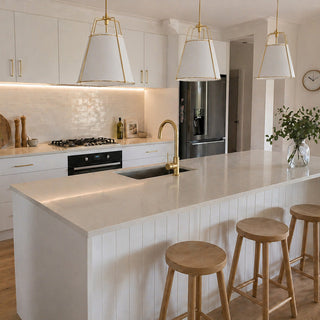 Reno polished gold kitchen mixer tap angled view showing profile