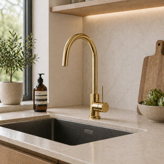 Reno polished gold kitchen mixer tap in lifestyle kitchen setting